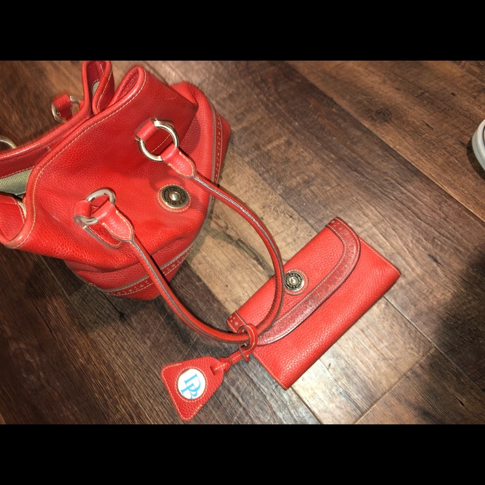 Dooney and Burke red purse with matching wallet